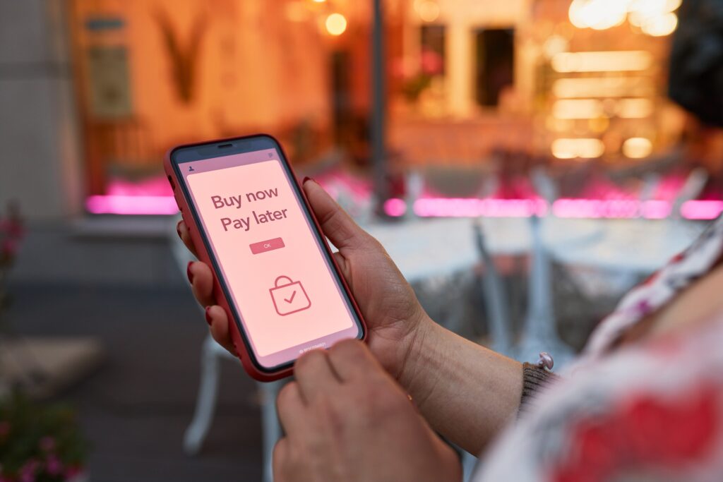 BNPL Buy now pay later online shopping service on smartphone. Paying after delivery. Afterpay app